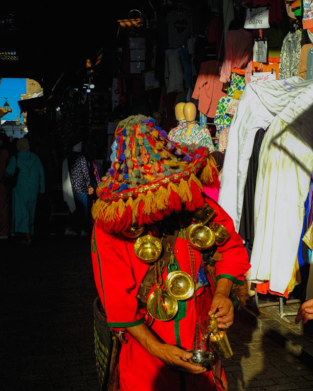 Colorful Traditional Water Seller in Moroccan Souk in FEz