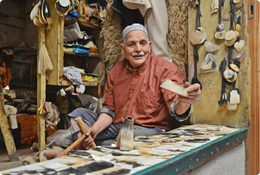 Elderly man making headbrushes in Fez by hand