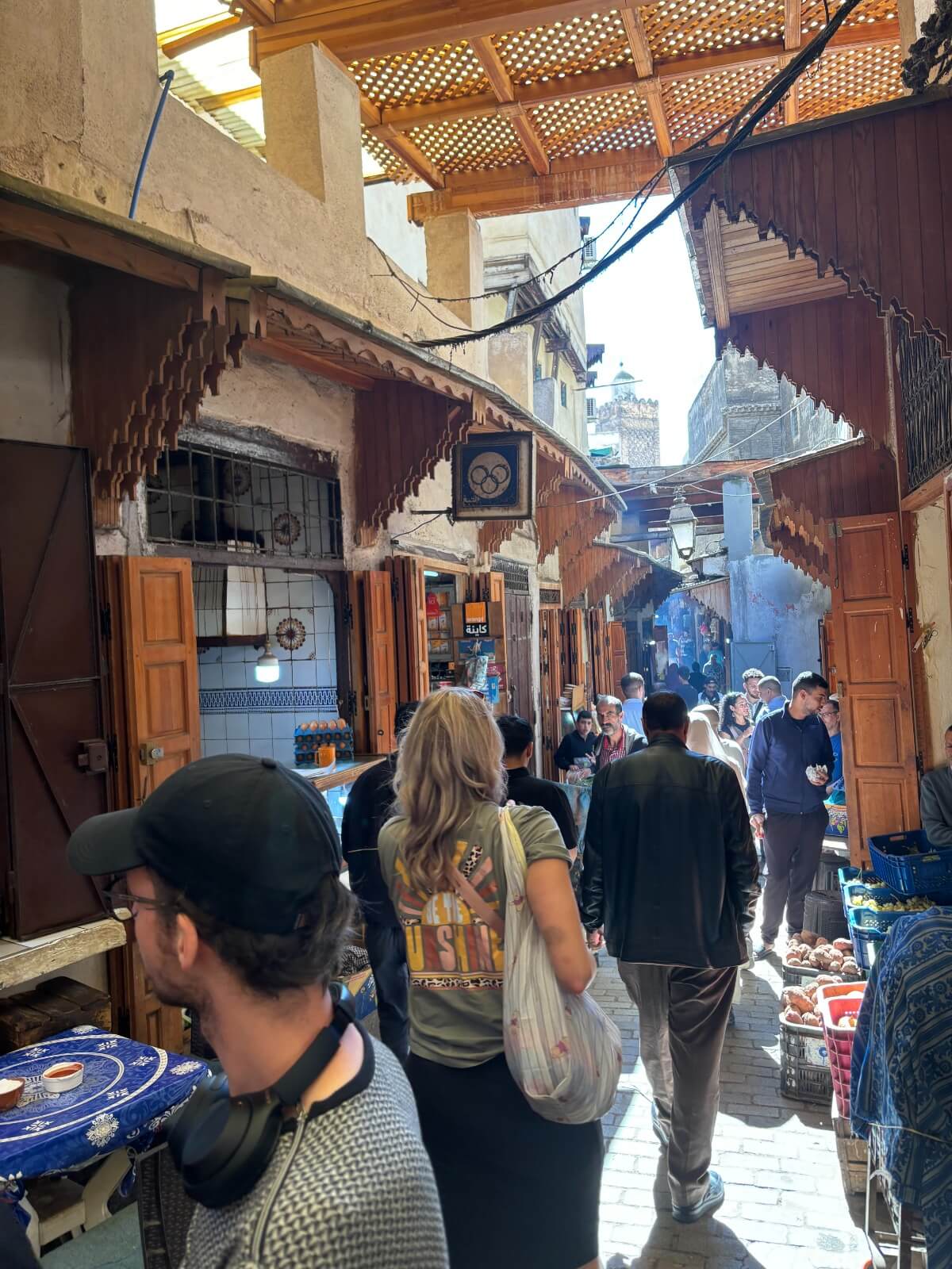 Tourists walking in the streets of Fez