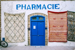 a local pharmacie in Essaouira painted in white and blue