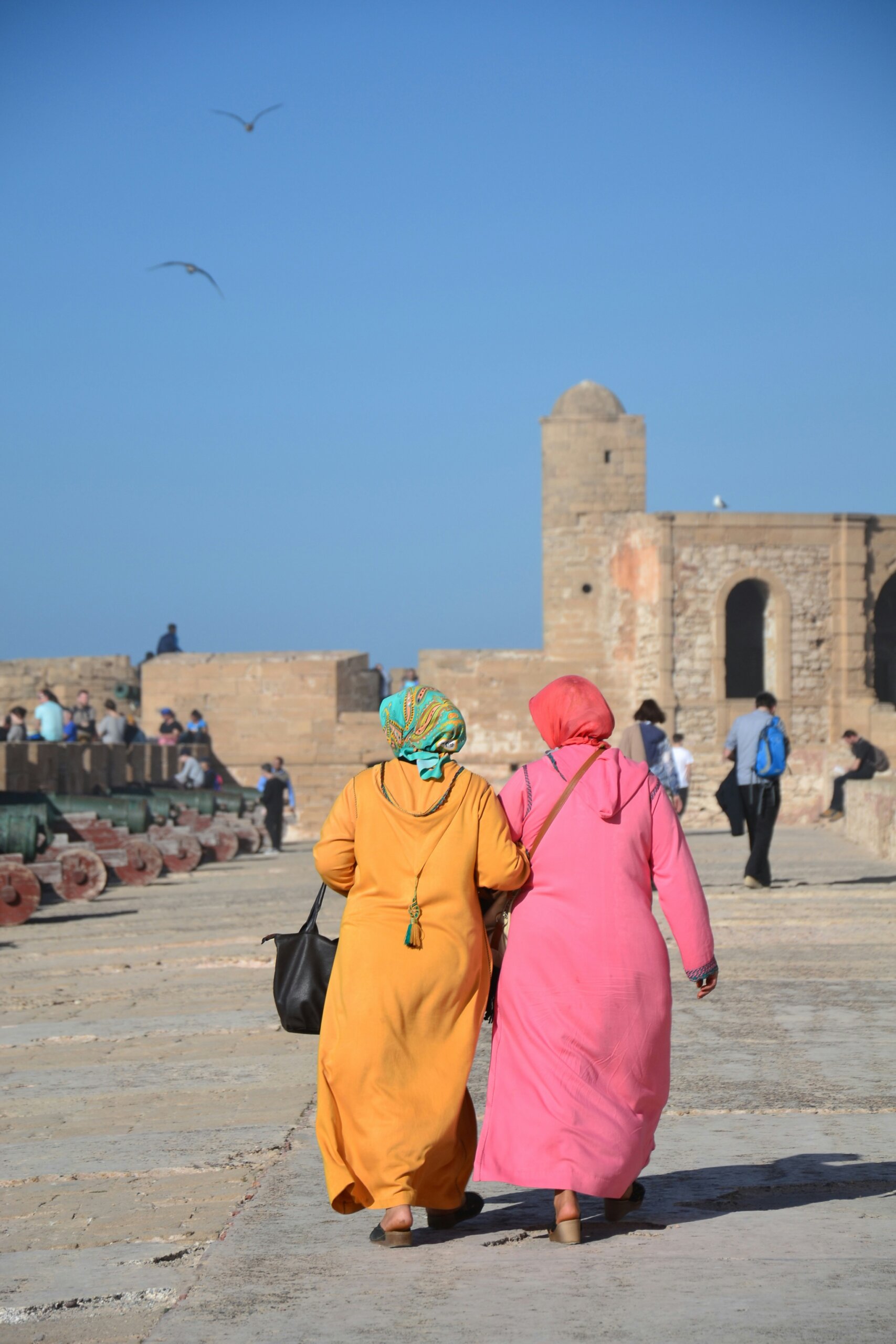 two women walking down the street in Morocco